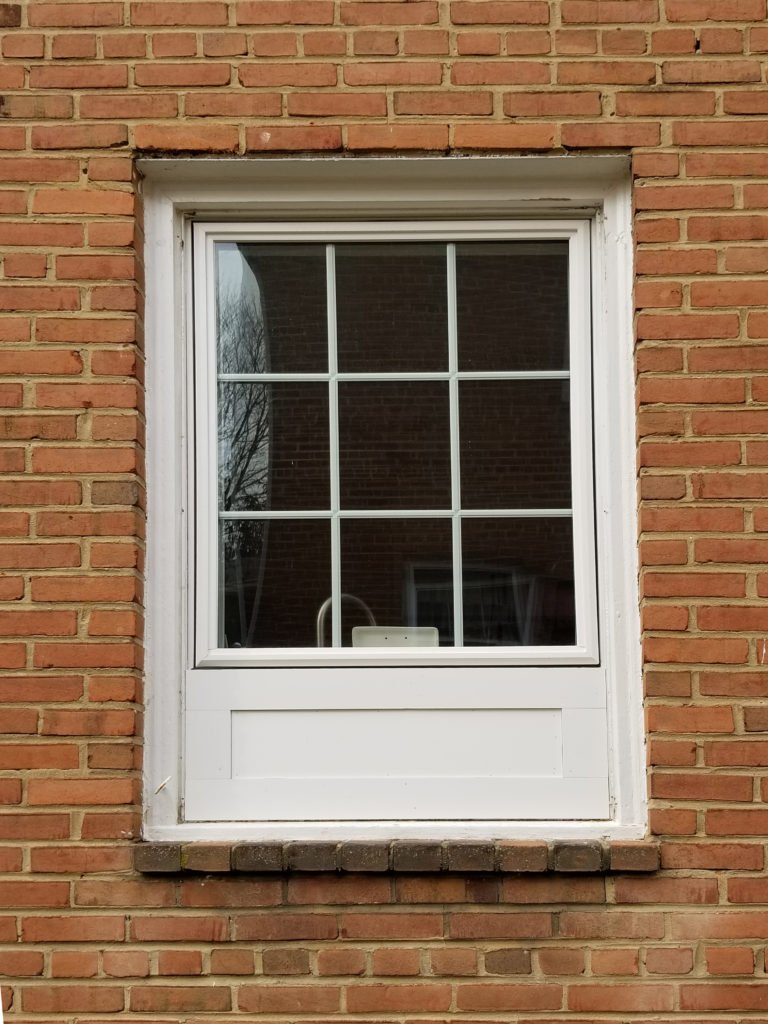 Window in brick opening